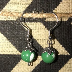 Single spotted green bead earrings